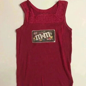 New! Cute tank with sewn on patch and rhinestones.